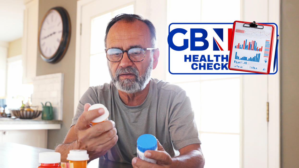 Man studying his medicine combinations