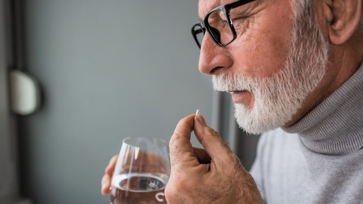 Man taking supplement