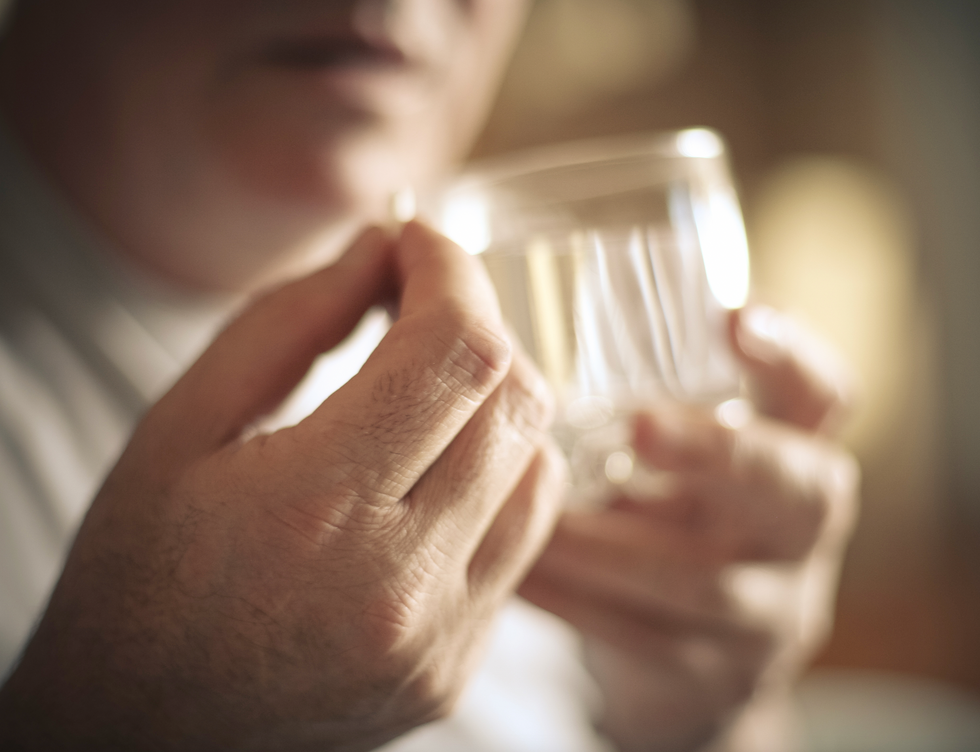 Man taking supplement