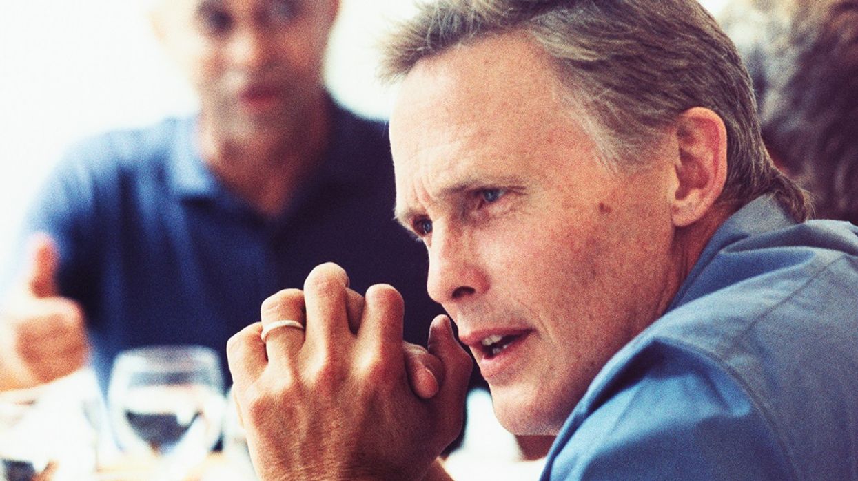 Man talking around a table