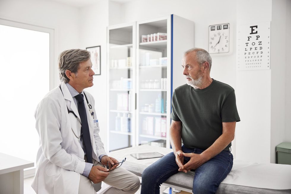 Man talking to doctor