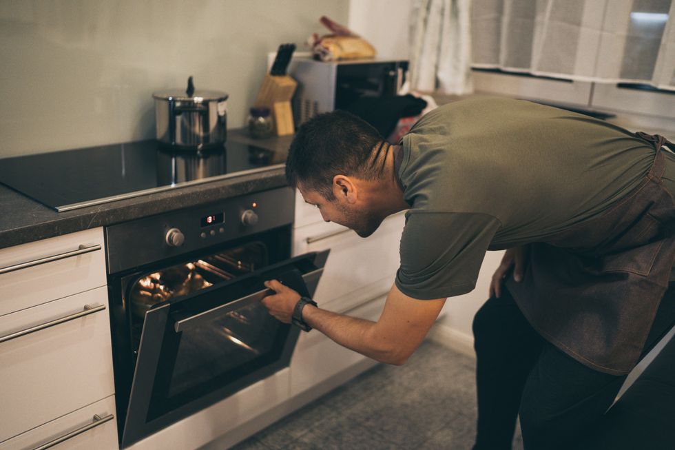 Man uses oven