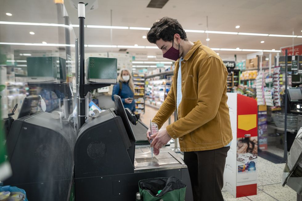 Man uses self-service scanner\u200b