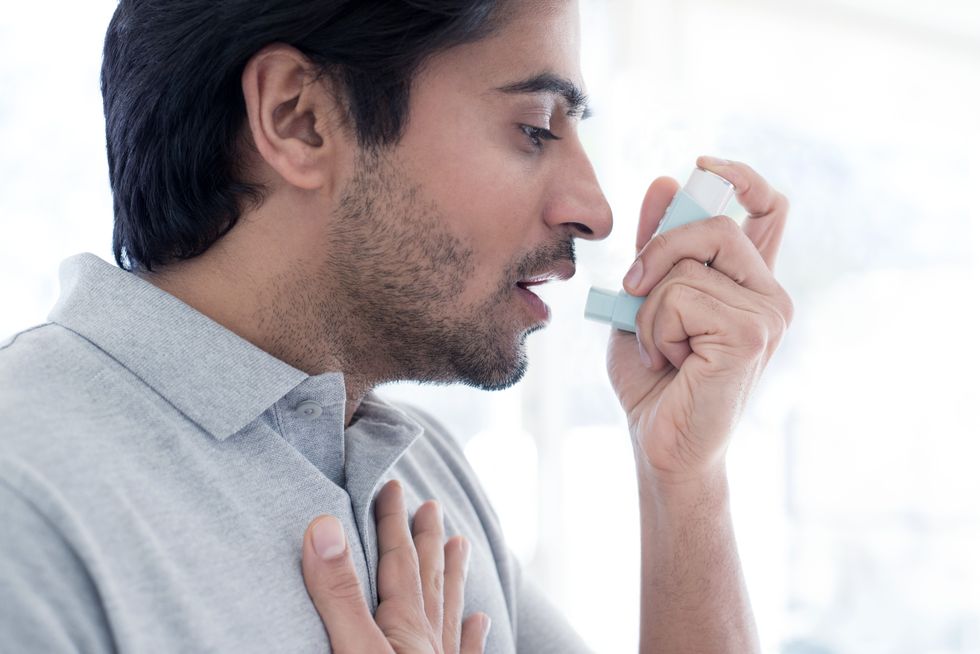 Man using inhaler
