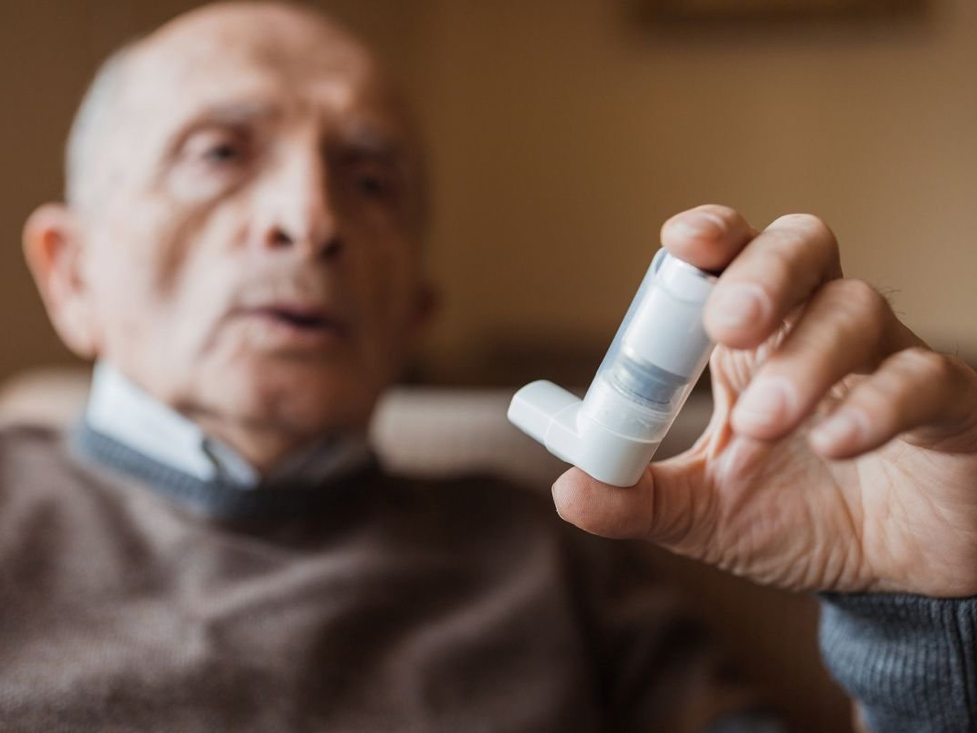 man using inhaler