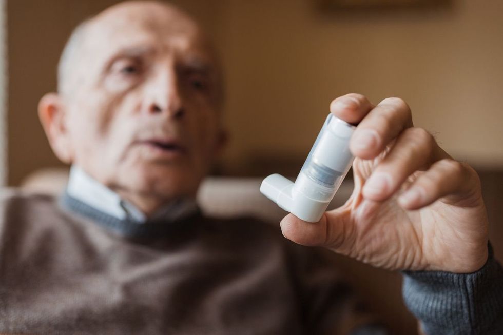 man using inhaler