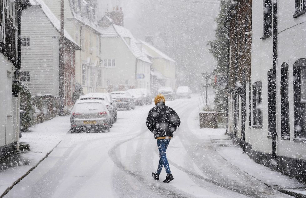 Man walking in snowy weather