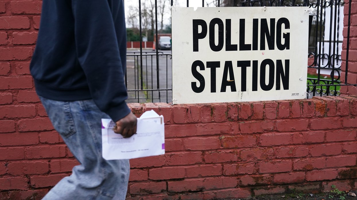 man walking to polling station