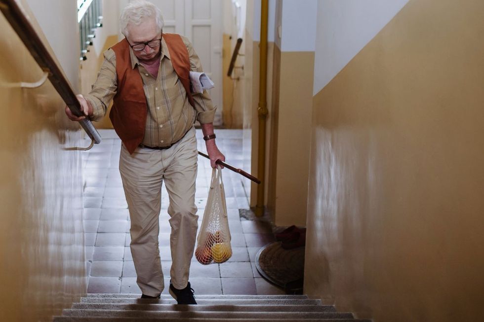 Man walking up the stairs