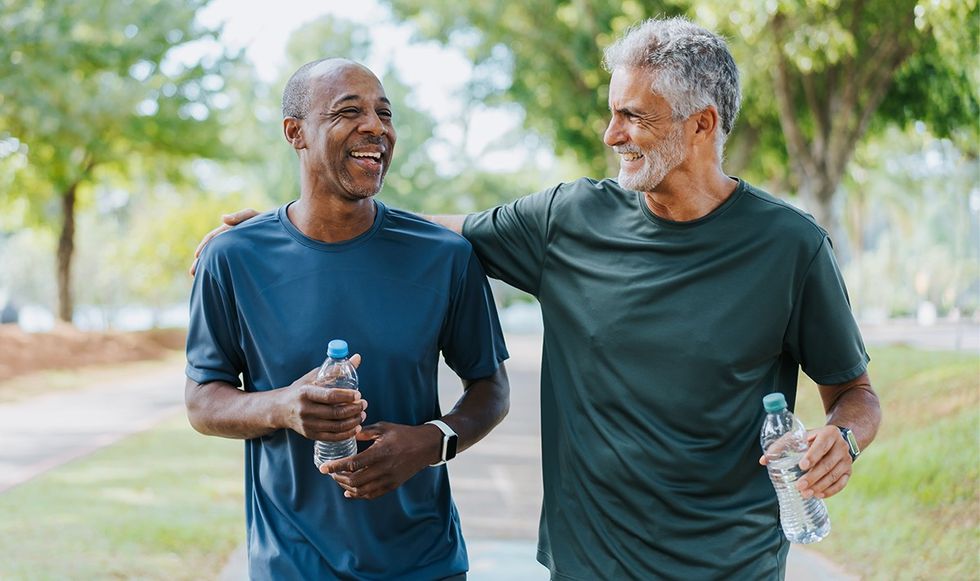 Man walking with his friend in a park