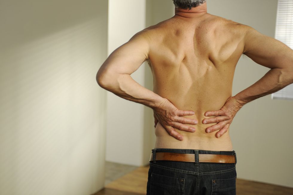 MAN WITH BACK PAIN
