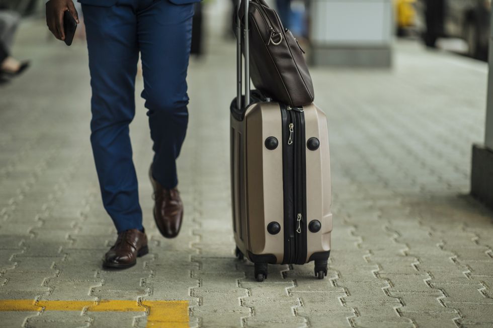 Man with carry-on luggage
