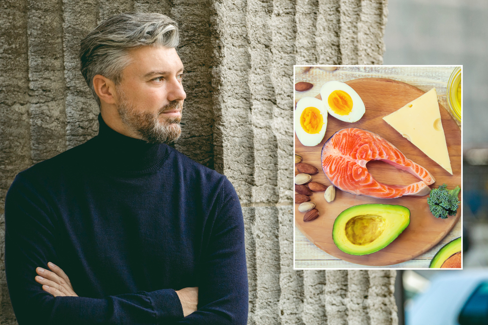 Man with grey hair / salmon, eggs and avocado