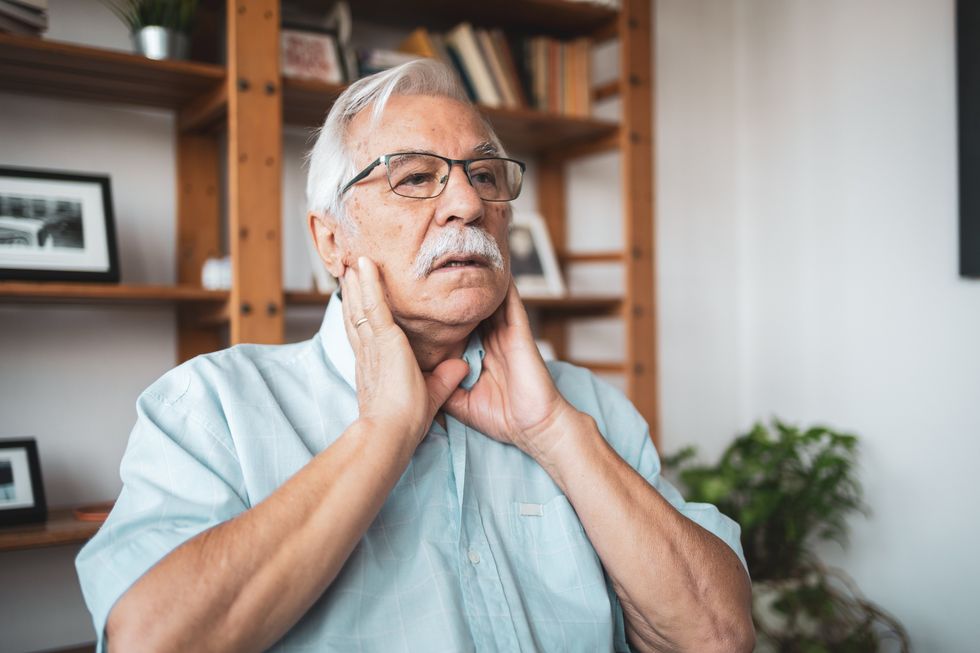 MAN WITH SORE THROAT