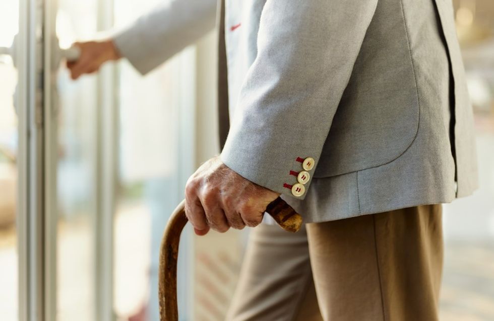 MAN WITH WALKING STICK