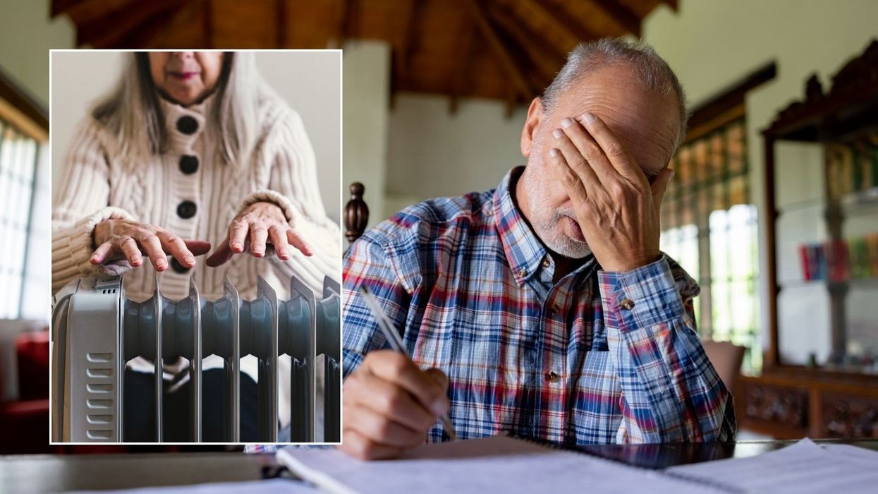 Man worried about bills and woman using heater