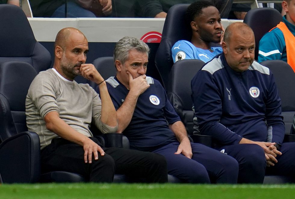 Manchester City manager Pep Guardiola (left) with assistants Juanma Lillo (centre) and Rodolfo Borrell during the Premier League match at the Tottenham Hotspur Stadium, London.