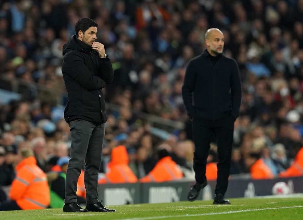 Manchester City manager Pep Guardiola (left) with assistants Juanma Lillo (centre) and Rodolfo Borrell during the Premier League match at the Tottenham Hotspur Stadium, London.
