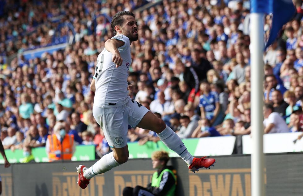 Manchester City's Bernardo Silva celebrates scoring their first goal against Leicester City.