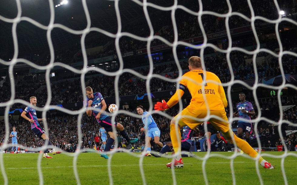 Manchester City's Jack Grealish scores their side's fourth goal of the game during the UEFA Champions League, Group A match at the Etihad Stadium, Manchester.