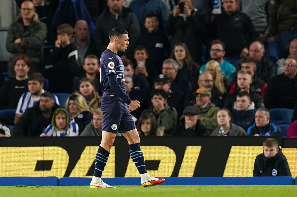 Manchester City's Phil Foden celebrates scoring their side's second goal of the game during the Premier League match at the AMEX Stadium, Brighton