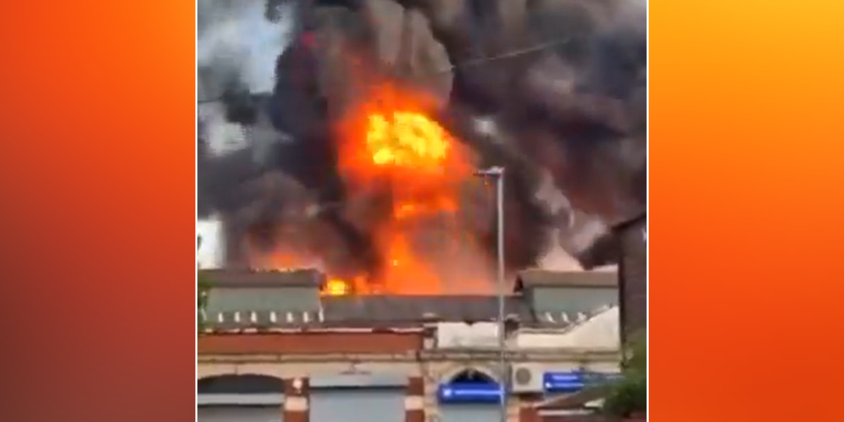 NextImg:Manchester fire: Huge flames engulf building as billows of smoke fill sky