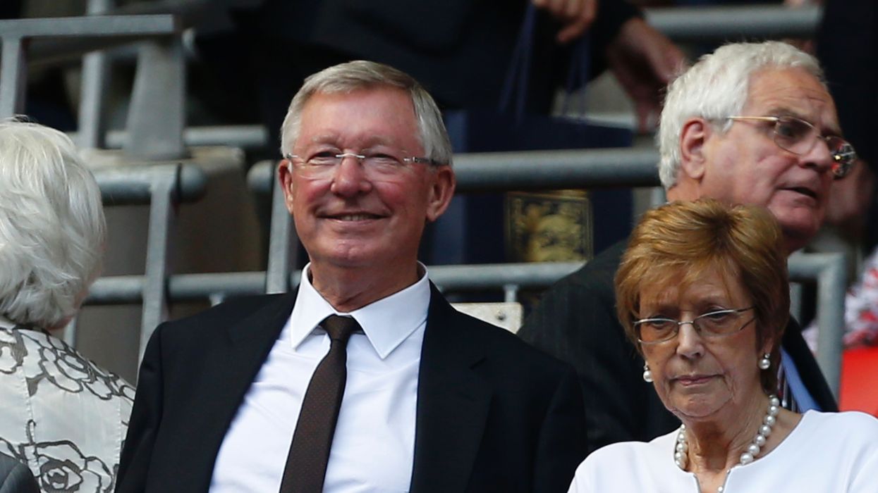 Manchester United's former Scottish manager Alex Ferguson (L) and his wife Cathy (R)