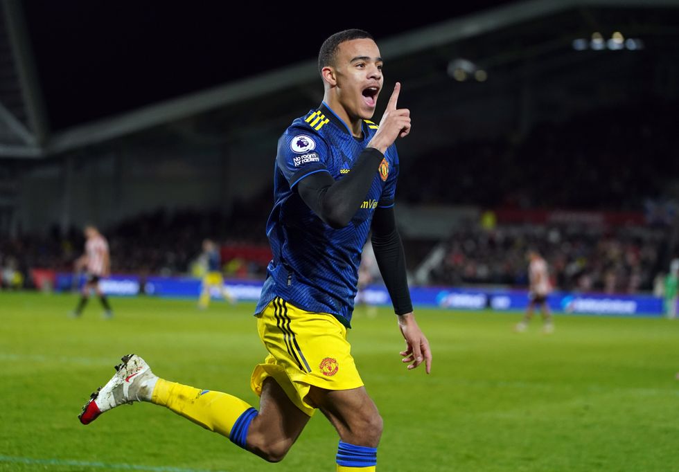 Manchester United's Mason Greenwood celebrates scoring the second goal of the game during the Premier League match at the Brentford Community Stadium, London