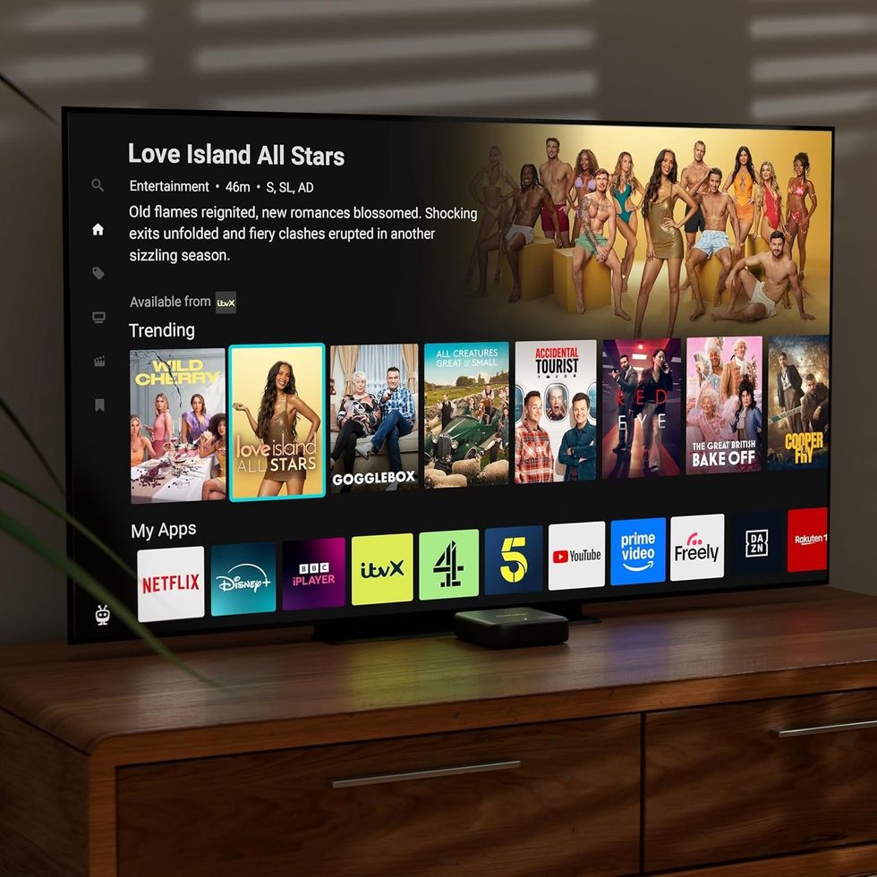 Manhattan Aero 4K TV Streamer in front of TV