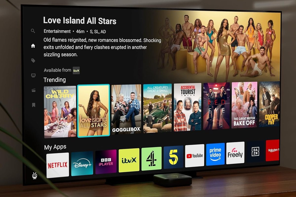 Manhattan Aero 4K TV Streamer with Freely in front of flat screen TV