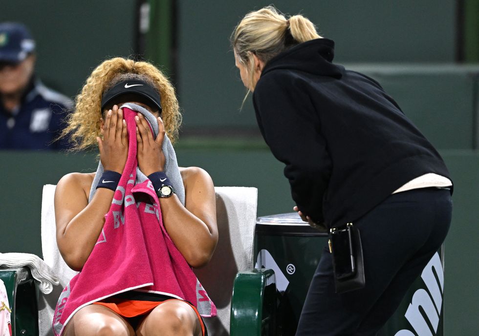 Mar 12, 2022; Indian Wells, CA, USA; Naomi Osaka (JPN) is emotional as she talks to referee after a fan disrupted before the start of her 2nd round match against Veronika Kudermetova (RUS) at the BNP Paribas open at the Indian Wells Tennis Garden. Mandatory Credit: Jayne Kamin-Oncea-USA TODAY Sports