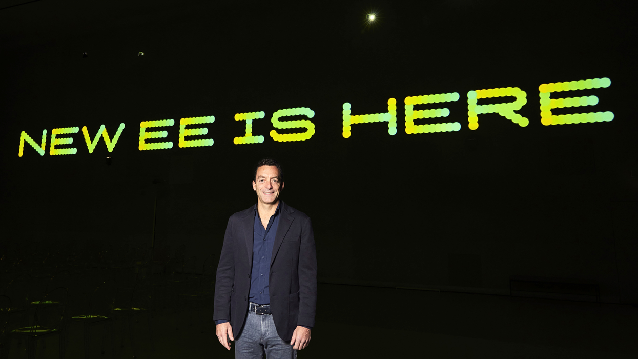 Marc Allera head of EE and BT consumer is pictured on-stage during the launch event for the 'new ee'