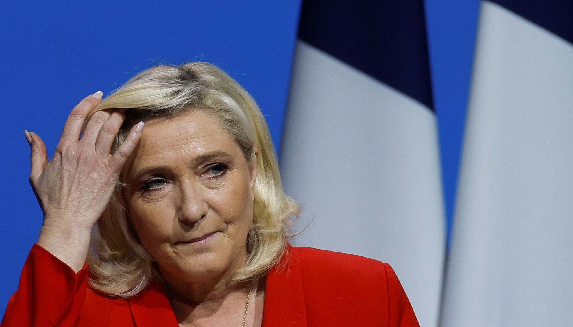 Marine Le Pen, French far-right National Rally (Rassemblement National) party candidate for the 2022 French presidential election, gestures during a campaign meeting in Avignon, France, April 14, 2022. REUTERS/Christian Hartmann