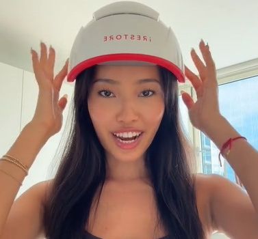 Marissa trying on her red light helmet