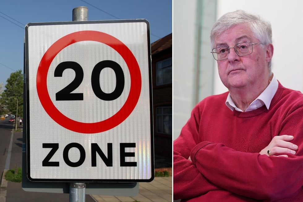 Mark Drakeford and 20mph road sign