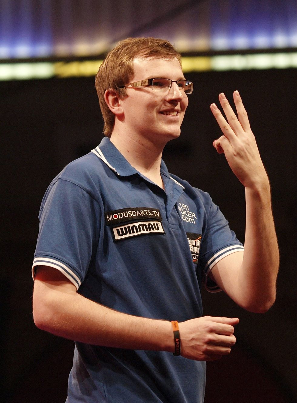 Mark Webster retratado durante sua carreira nos dardos