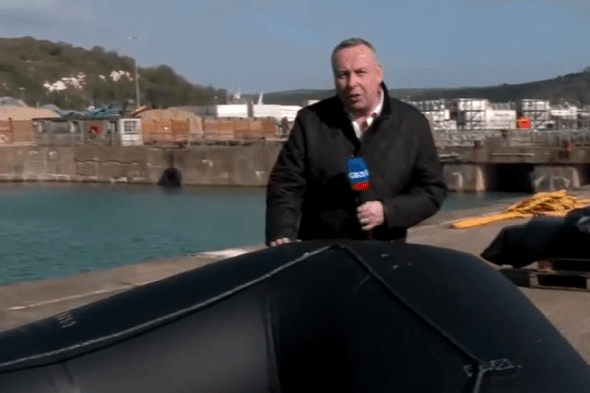 Mark Whte on the shores of Dover by small boat