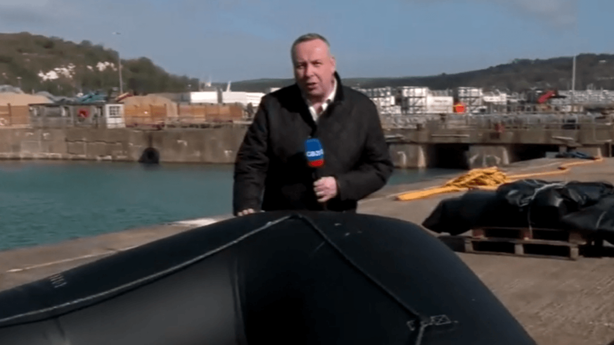 Mark Whte on the shores of Dover by small boat