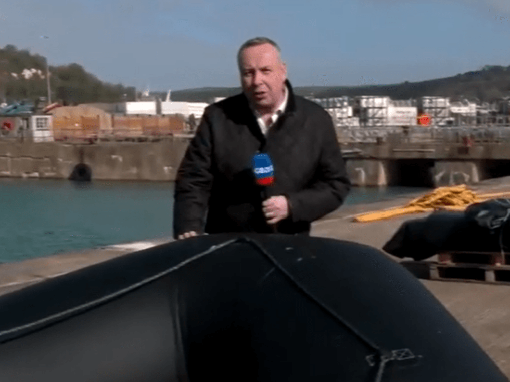Mark Whte on the shores of Dover by small boat