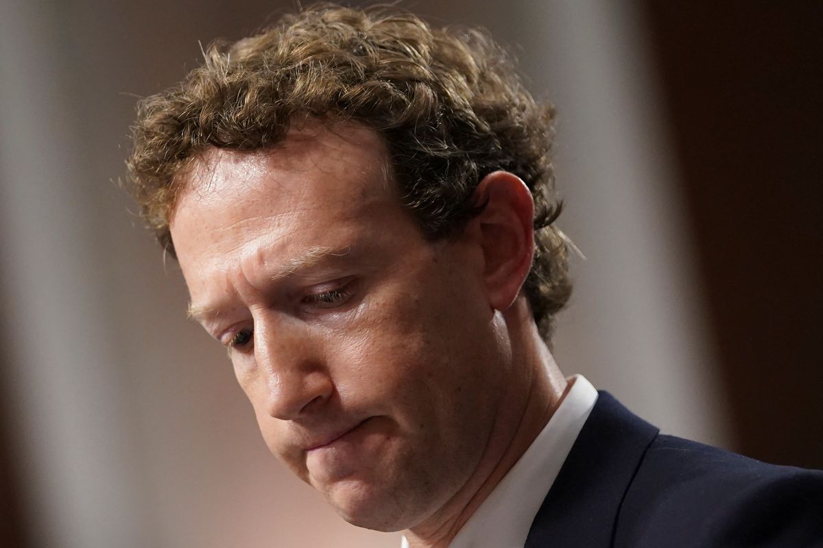 mark zuckerberg is pictured looking forlorn in a suit during a recent appearance in congress