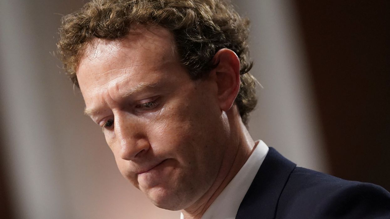 mark zuckerberg is pictured looking forlorn in a suit during a recent appearance in congress