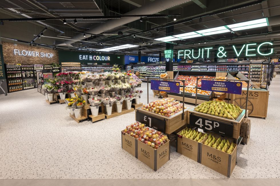 marks and spencer food aisle with fruit and vegeatables shown on display