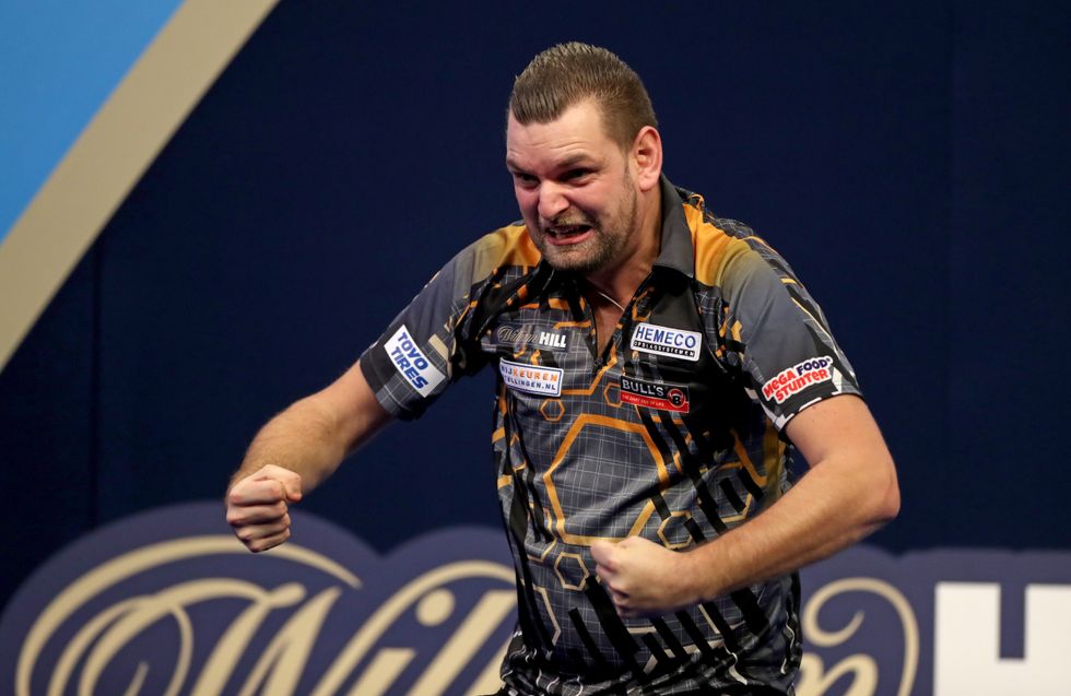 Martijn Kleermaker celebrates against Joe Cullen during day eleven of the William Hill World Darts Championship at Alexandra Palace, London. Picture date: Tuesday December 28, 2021.