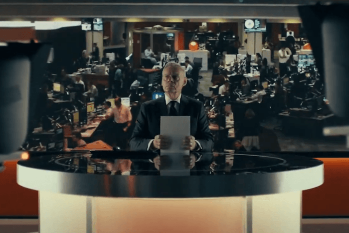 Martin Clunes as Huw Edwards