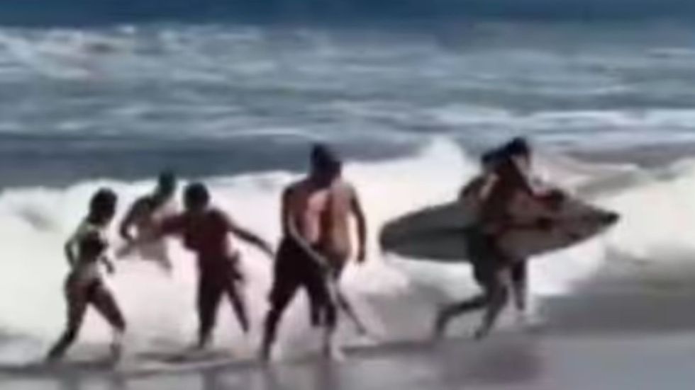 Former Man City star and his children rescued at sea as details of 'miracle' emerge