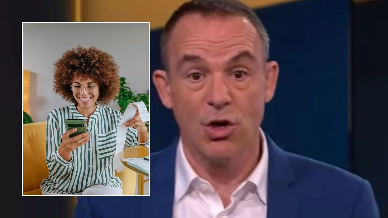 Martin Lewis and woman looking at bill