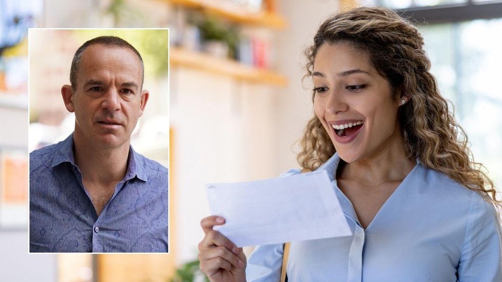 Martin Lewis and woman looking at letter