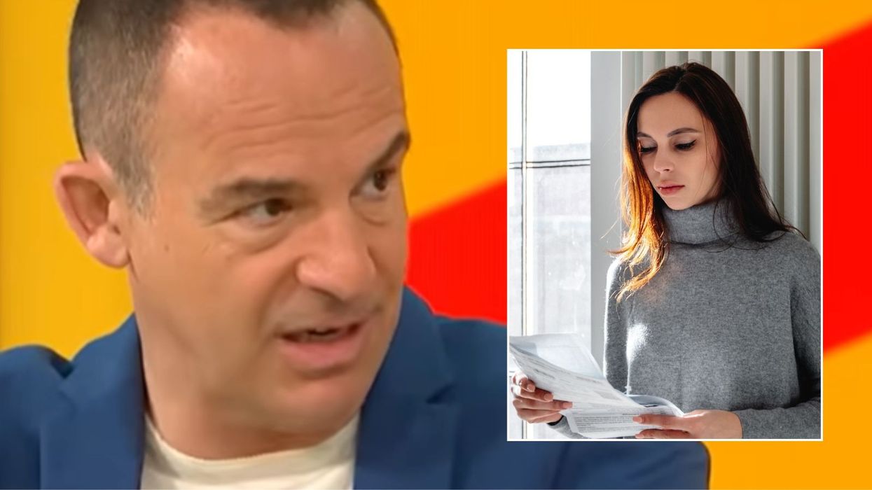 Martin Lewis and woman looking at letter