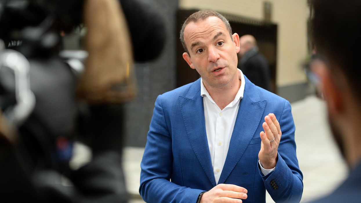 Martin Lewis talking to reporters