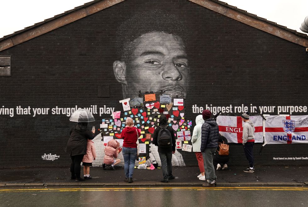 Marcus Rashford says ‘I’ll be back stronger’ as mural defaced after penalty miss